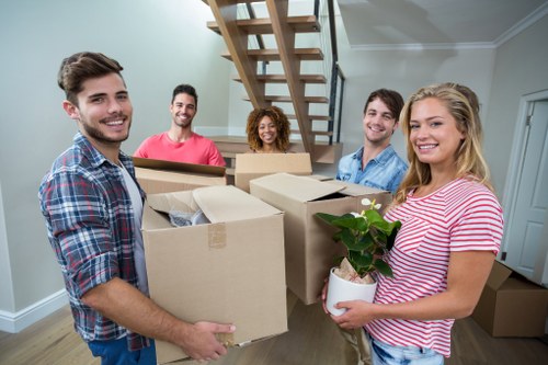 Removal team planning a home move in an Islington street