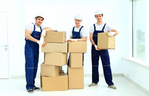 Moving boxes and sofa from an Islington apartment