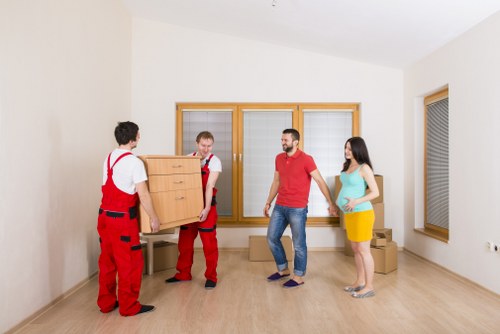 Local movers handling household items for a property move in Islington