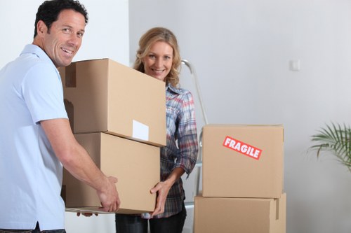 Packed boxes and furniture ready for removal van transport