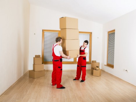 Loading household furniture into a van for an Islington removal